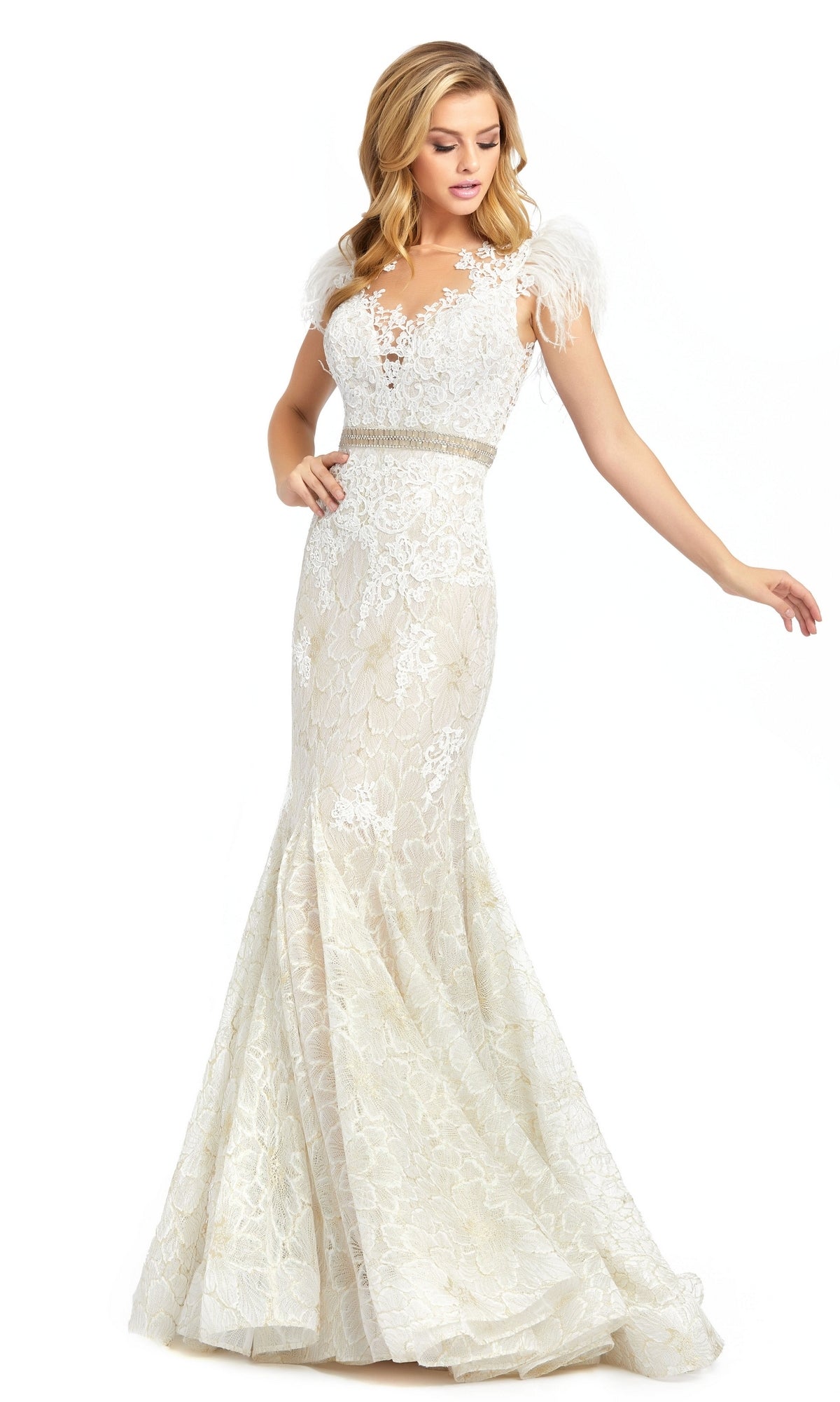 A woman poses against a plain white background in the Mac Duggal 79230 Feathered Long Lace Formal Dress—a floor-length, fitted white gown featuring cap sleeves and a beaded waistband.